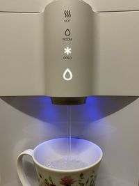 Close-up of coffee cup on table