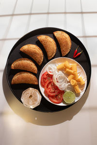 High angle view of dessert served on table