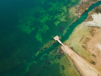 High angle view of surf on shore