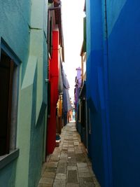 Narrow alley along buildings