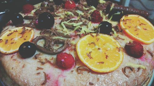 High angle view of fruits in plate on table