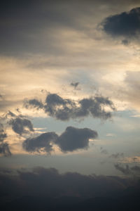 Low angle view of dramatic sky during sunset