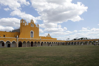 View of historic building against cloudy sky