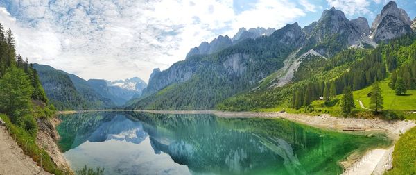 Panoramic view of lake and mountains against sky