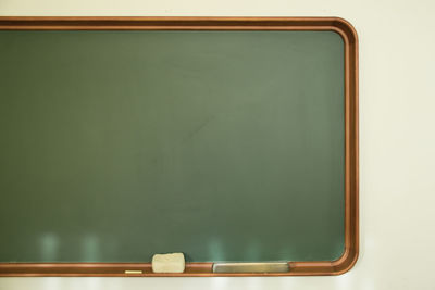 Close up of blackboard mounted on wall