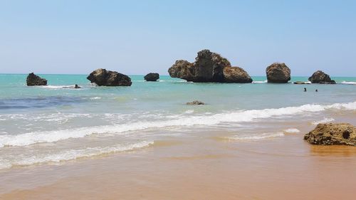 Scenic view of sea against clear sky