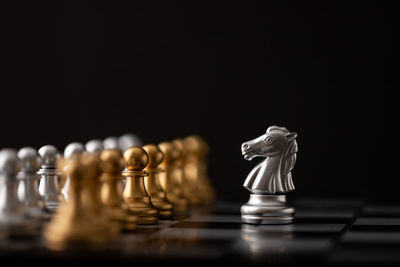 Close-up of chess pieces against blurred background