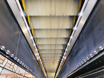 Low angle view of escalator at subway station