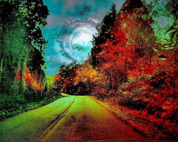 Scenic view of trees against sky during autumn