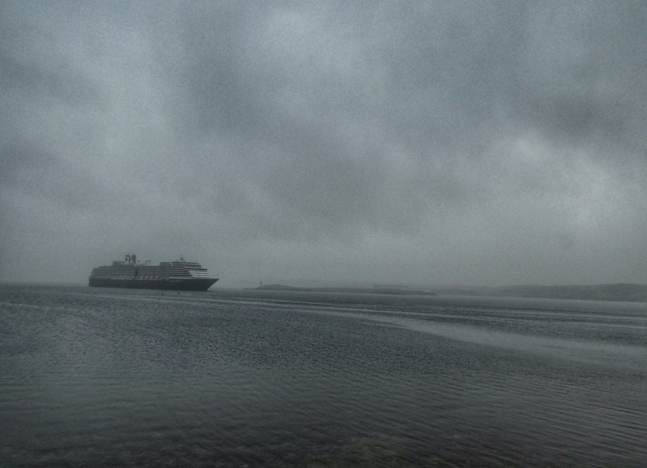 SHIP SAILING ON SEA AGAINST SKY