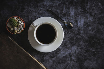 High angle view of coffee cup on table