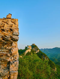 Great wall of china on mountain against clear sky