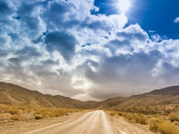 Country road passing through landscape