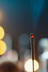 Close-up of illuminated lighting equipment
