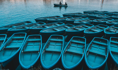 High angle view of boats moored in water