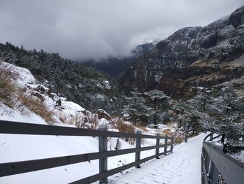 Snow covered mountain against sky