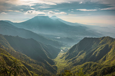 Scenic view of mountains against sky during sunset