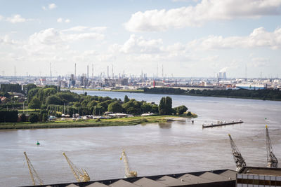 View of city against cloudy sky