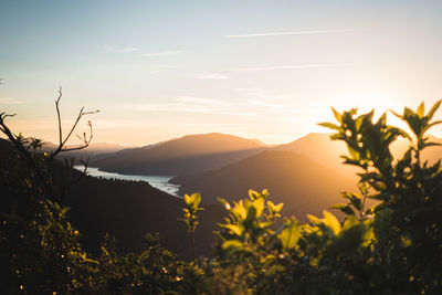 Scenic view of mountains against sky during sunset