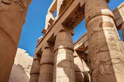 Different hieroglyphs on the walls and columns in the karnak temple.