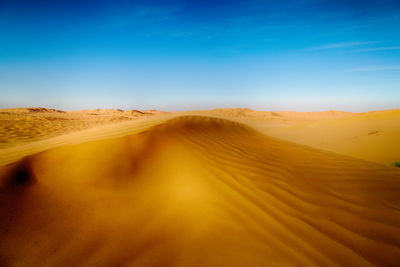 Scenic view of desert against sky