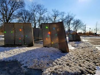 Garbage on bare trees in winter