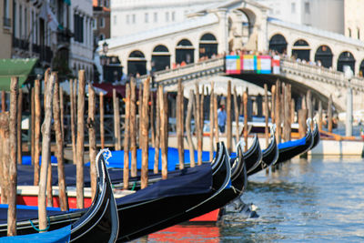 Gondolas moored on canal