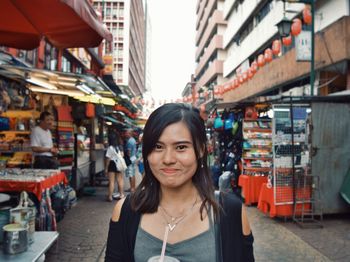 Portrait of woman in city