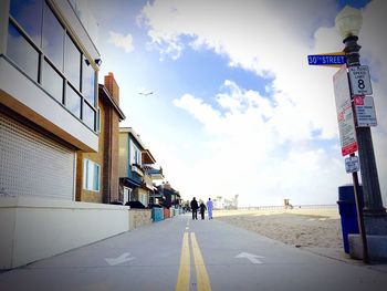 Road with buildings in background