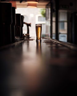 Close-up of beer on table