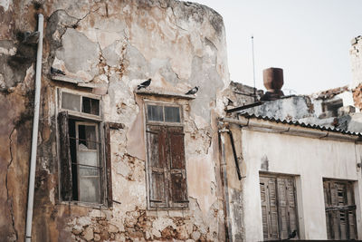 Low angle view of old building against sky