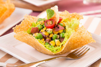 Close-up of food served on table