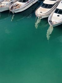 High angle view of boats moored in sea