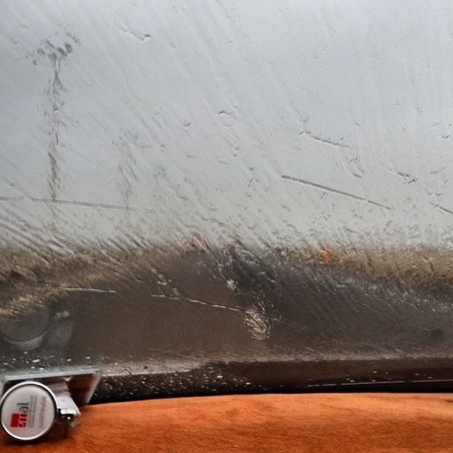 transportation, mode of transport, land vehicle, car, part of, cropped, water, vehicle interior, glass - material, close-up, travel, car interior, day, reflection, transparent, wet, motion, technology