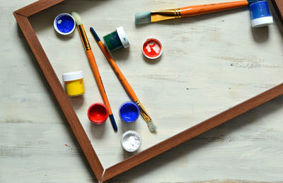 Close-up of multi colored pencils on table