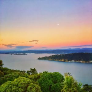 Scenic view of sea at sunset