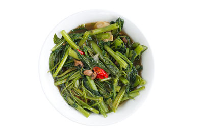 Close-up of salad in bowl against white background