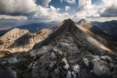 Panoramic view of mountain range against sky