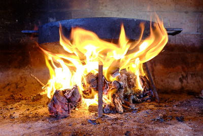 Close-up of fire burning at night