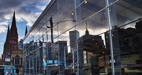 Reflection of buildings on glass window