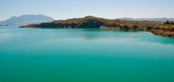 View of calm blue sea against the sky