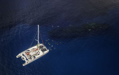 High angle view of sailboat on sea against sky