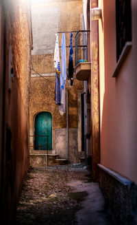 Alley amidst houses in building