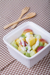 High angle view of salad in bowl on table