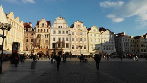 Group of people in front of historical building