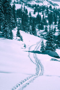 Scenic view of snowcapped mountains during winter