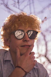 Close-up of young man wearing sunglasses