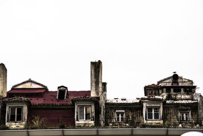 Residential buildings against clear sky