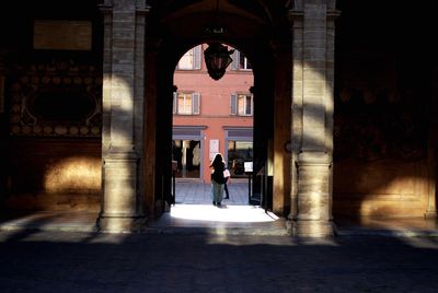 People walking in corridor