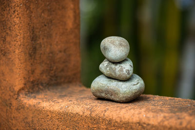 Close-up of stone stack on rock